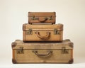 Unearthing Stories: The Elegance of Three Vintage Suitcases Side by Side