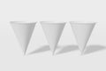 Set of three white paper mockup cups cone shaped on a white background. 3D rendering Royalty Free Stock Photo