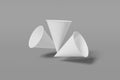 Set of three white paper mockup cups cone shaped fly on a grey background. 3D rendering Royalty Free Stock Photo