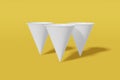 Set of three white paper mockup cups cone shaped on a yellow background. 3D rendering Royalty Free Stock Photo