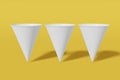 Set of three white paper mockup cups cone shaped on a yellow background. 3D rendering Royalty Free Stock Photo