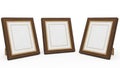 Set of three wooden picture frames isolated on white background Royalty Free Stock Photo