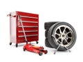 Set of tires, hydraulic car jack and workshop tool cabinet on white Royalty Free Stock Photo