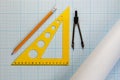 Set of tools for drawing on an graph paper. Ruler, compass, pencil on sheet of paper for drawing Royalty Free Stock Photo
