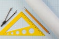 Set of tools for drawing on an graph paper. Ruler, compass, pencil on sheet of paper for drawing Royalty Free Stock Photo