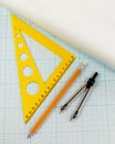 Set of tools for drawing on an graph paper. Ruler, compass, pencil on sheet of paper for drawing Royalty Free Stock Photo