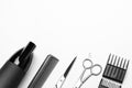 A set of tools for hairdresser, hairdryer, scissors, comb, on white background, top view, a copy of the space Royalty Free Stock Photo