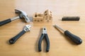 Set of tools and handmade wood house toy. Royalty Free Stock Photo