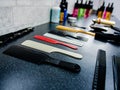 Barbershop. The atmosphere of preparation at the reception of the next client for a haircut at the hairdresser. Lots Royalty Free Stock Photo