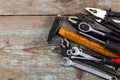 Set of tools over a wooden background with space for text Royalty Free Stock Photo
