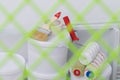 A set of tools for painting the surface, against the background of a green mesh, rollers, buckets, paints, stairs Royalty Free Stock Photo