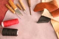 Set of tools with threads on leather in workshop Royalty Free Stock Photo
