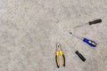 Set of tools to carry out repairs lie on the floor. mockup photo background industrial background