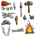 Set of tools and weapons of the caveman. Spear and fire