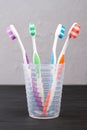 Set of toothbrushes in glass. Royalty Free Stock Photo