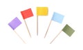 Set of toothpicks with small colorful paper flags on white background, top view Royalty Free Stock Photo