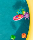 Set of toys for children in a blue children`s pool Royalty Free Stock Photo