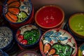 Set of traditional Spanish ceramic pottery and ashtrays in flea market shop, typical Spain