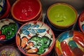 Set of traditional Spanish ceramic pottery and ashtrays in flea market shop, typical Spain