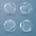 Set of transparent soap bubbles on dark blue background Royalty Free Stock Photo