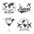 Set of travel badge, logo Travel inspiration quotes with globe, airplane, suitcase and cocktail silhouette. Vector Royalty Free Stock Photo