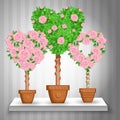 Set of trees with roses and hearts in pots