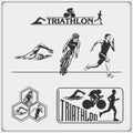 Set of triathlon labels, emblems badges and design elements. Swimming, cycling and running. Royalty Free Stock Photo