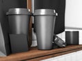 Set of two black take away cups, blank business cards on bookshelf. 3d render Royalty Free Stock Photo