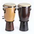 Pair of diverse conga drums exhibiting musical instrument artistry and design on white background Royalty Free Stock Photo
