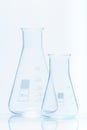 Set of two empty temperature resistant conical flasks for measurments Royalty Free Stock Photo