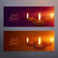 Set of two happy diwali horizontal banners with glowing diya Royalty Free Stock Photo