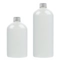 Set of two plastic tall and low bottles with water, silver cap mockup, isolated, template. Royalty Free Stock Photo