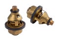 Set of two thermostats of the truck engine cooling system. Spare parts on white background