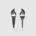 Set of two torches with fire. Vector illustration.
