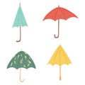 Set umbrellas different forms on white background. Abstract umbrellas red, blue, yellow and green color with flowers and polka dot Royalty Free Stock Photo