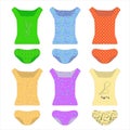 A set of underwear. T-shirts and panties of different colors. Cartoon clothes. Bright patterns on multi-colored clothes Royalty Free Stock Photo