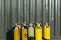 Set of yellow oxygen bottles for scuba diving