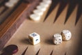 Dice on board game, playing backgammon Royalty Free Stock Photo