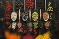 A set of varied seeds and spices in spoons on a dark background. Top view, flat lay. Multicolored spices