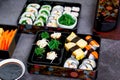 Set of variety sushi, Tamagoyaki, crabsticks sushi and maki in bento box served with soy sauce and wasabi. Delicious japanese food Royalty Free Stock Photo