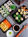 Set of variety sushi, Tamagoyaki, crabsticks sushi and maki in bento box served with soy sauce and wasabi. Delicious japanese food Royalty Free Stock Photo