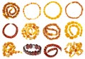 Set of various amber necklaces isolated on white