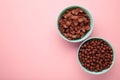 Set of various breakfast cereals on pink background. Vertical photo Royalty Free Stock Photo