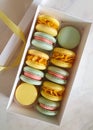 Set of various colored macarons and gift boxes with ribbon Royalty Free Stock Photo