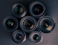 Set of various DSLR lenses with colorful reflections