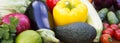 Set of various organic raw fruits and vegetables on wooden rustic table. Side view. Closeup Royalty Free Stock Photo