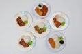set of various plates of food, deep-fried chicken, and deep-fried pork isolated on white background, top view. Royalty Free Stock Photo