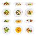 Set of various plates of food isolated on white background with Royalty Free Stock Photo