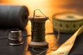 Set of various sewing supplies on table, focus on foreground Royalty Free Stock Photo