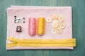 Set of various sewing supplies on wooden colorful surface Royalty Free Stock Photo